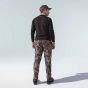 First Lite Men’s Navigator Pant in Specter camo with tapered legs, elastic cuffs, and PFAS-free DWR stretch shell over 37.5 fleece lining
