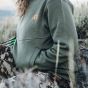 First Lite Women’s Furnace 350 Merino-X Hoody in Conifer with kangaroo pocket and snap-up Monks Hood Collar

