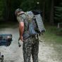 Latitude Ranger 33 backpack with compression panel, removable hip belt, internal frame stays, and side pockets
