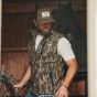 Mathews Bottomland Vest with DWR finish, taped zippers, bonded microfleece lining, and adjustable hem
