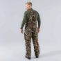 First Lite Core Insulated Bib Pant in Specter camo with full-length side zips, chest handwarmer pocket, and PrimaLoft Gold insulation
