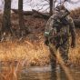First Lite Core Insulated Bib Pant in Specter camo with full-length side zips, chest handwarmer pocket, and PrimaLoft Gold insulation

